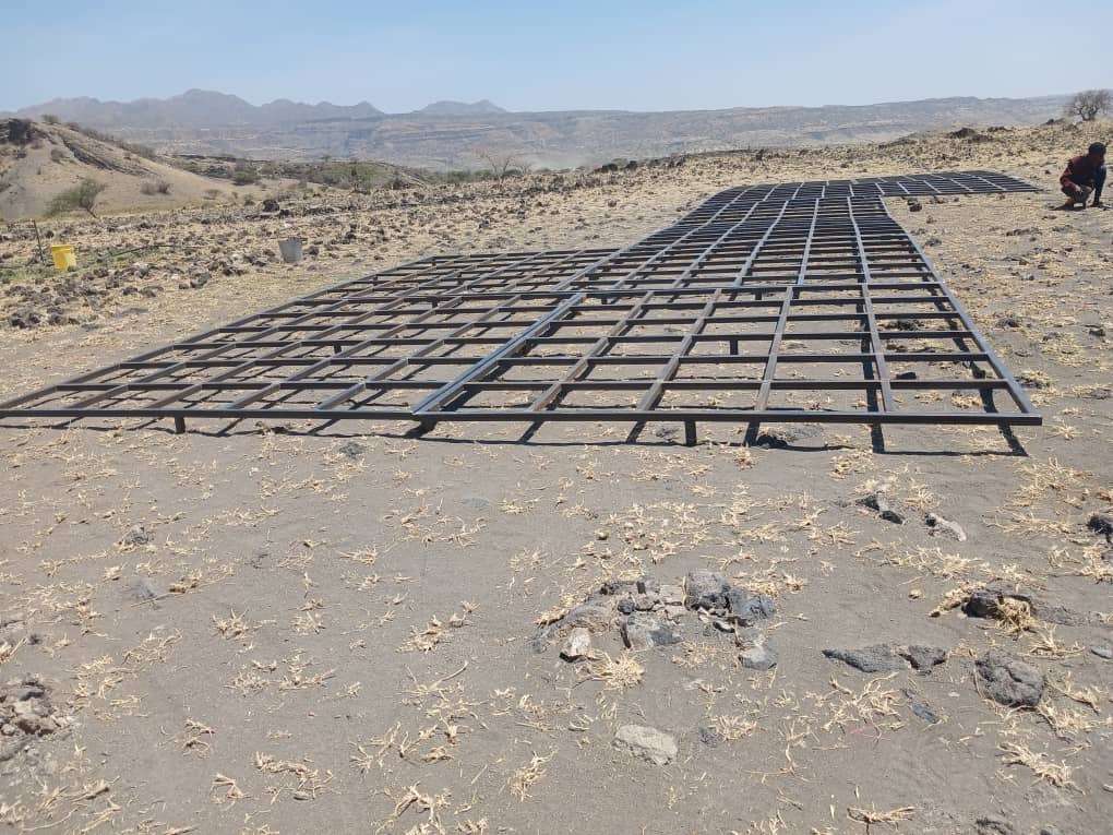 Steel sub-frame laid out on site for a recycled plastic deck platform