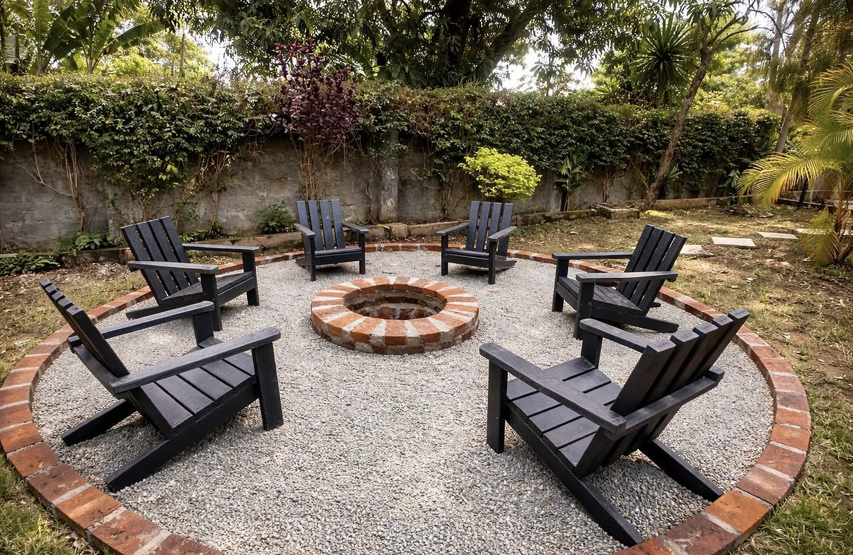 Recycled plastic Adirondack chairs around a fire pit